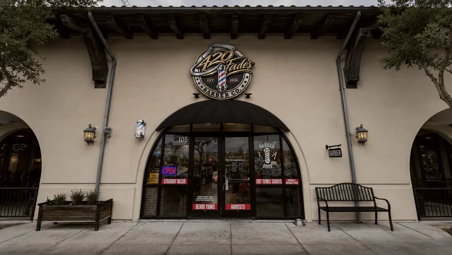 The 420 Fades storefront on Alameda Street, with the shop badge above the arched entrance.